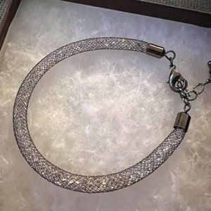 Silver chrome bracelet with Swarovski Crystals. New with box!
